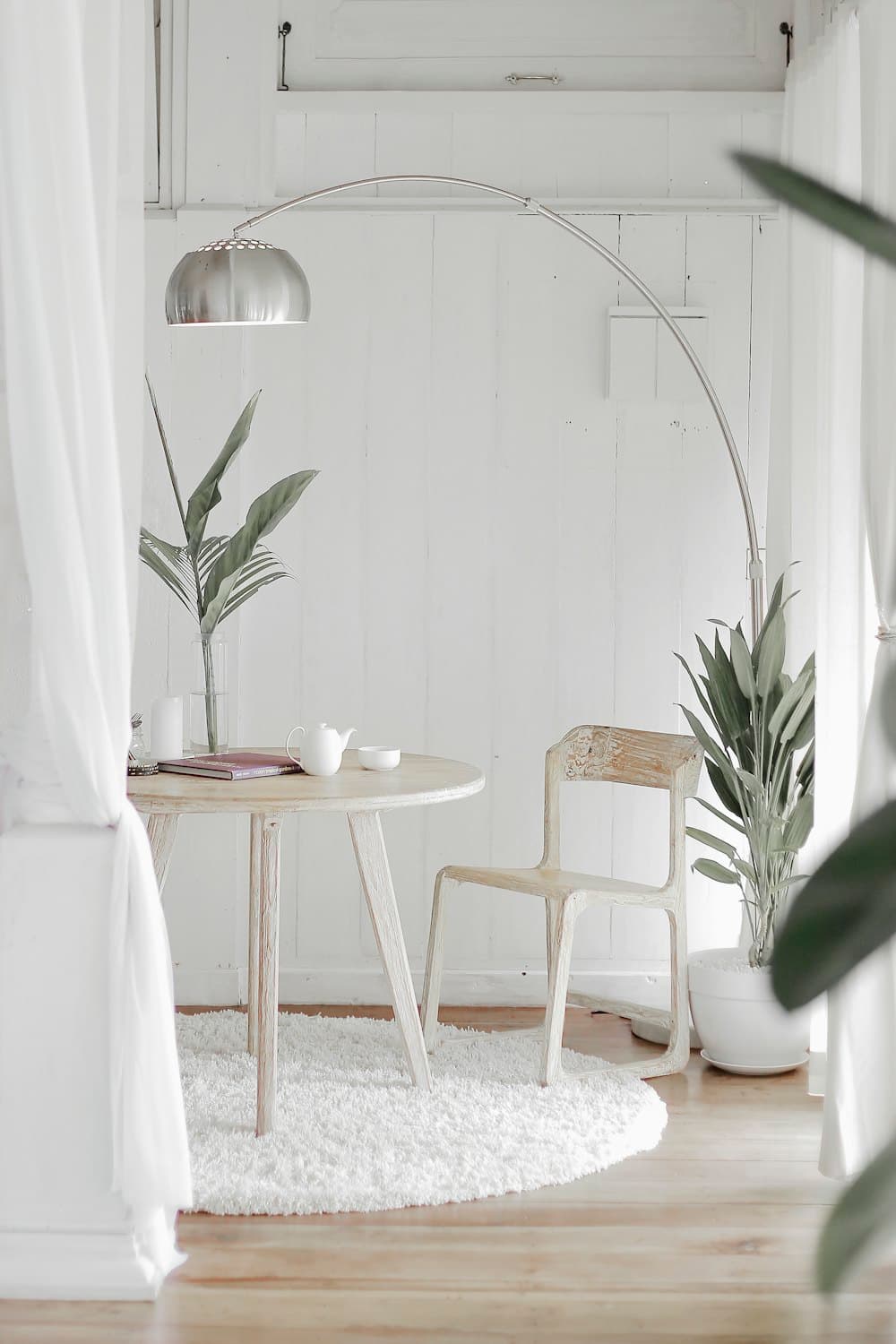 A calm, light-filled interior with natural wood and soft textures